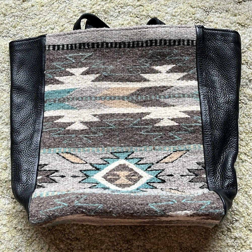 Saddle blanket and black leather handbag/tote bag with short handles